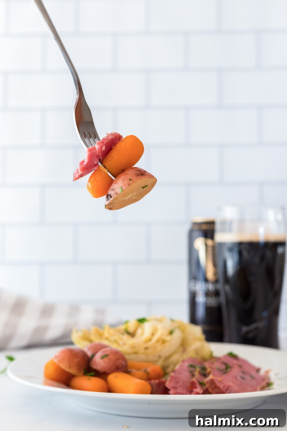 fork with corned beef and veggies