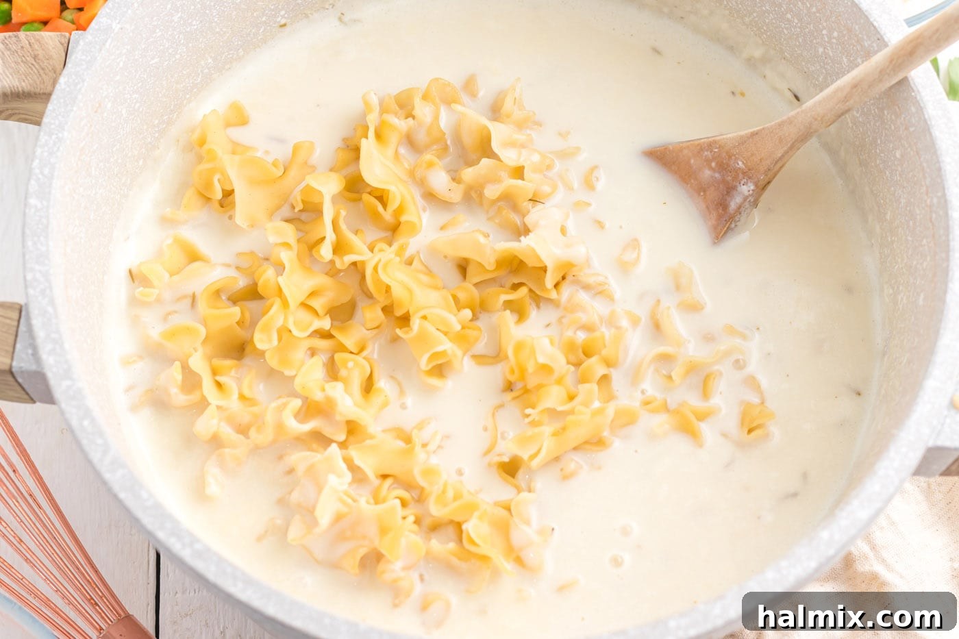 Creamy Chicken Noodle Delight 10 Cubed chicken, peas, and carrots added to the egg noodle and cream mixture.