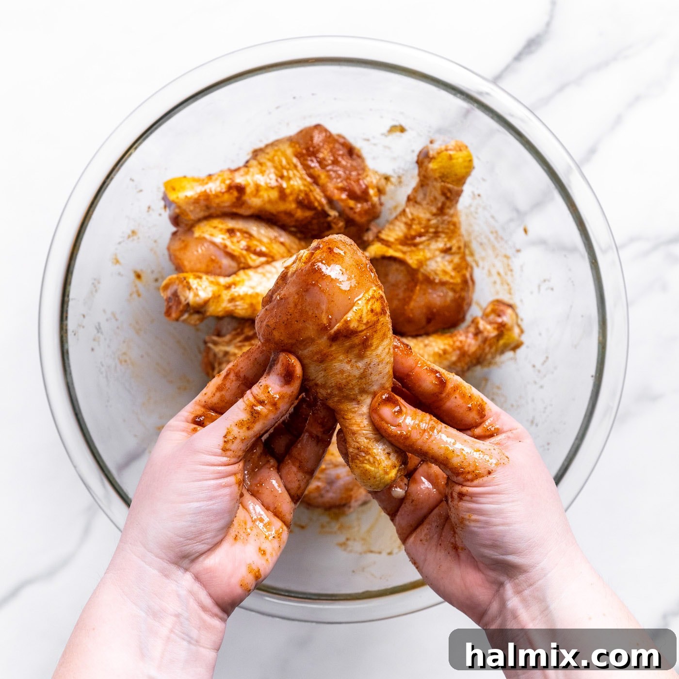 Golden Air Fried Drumsticks 5 chicken drumsticks with seasonings in a bowl