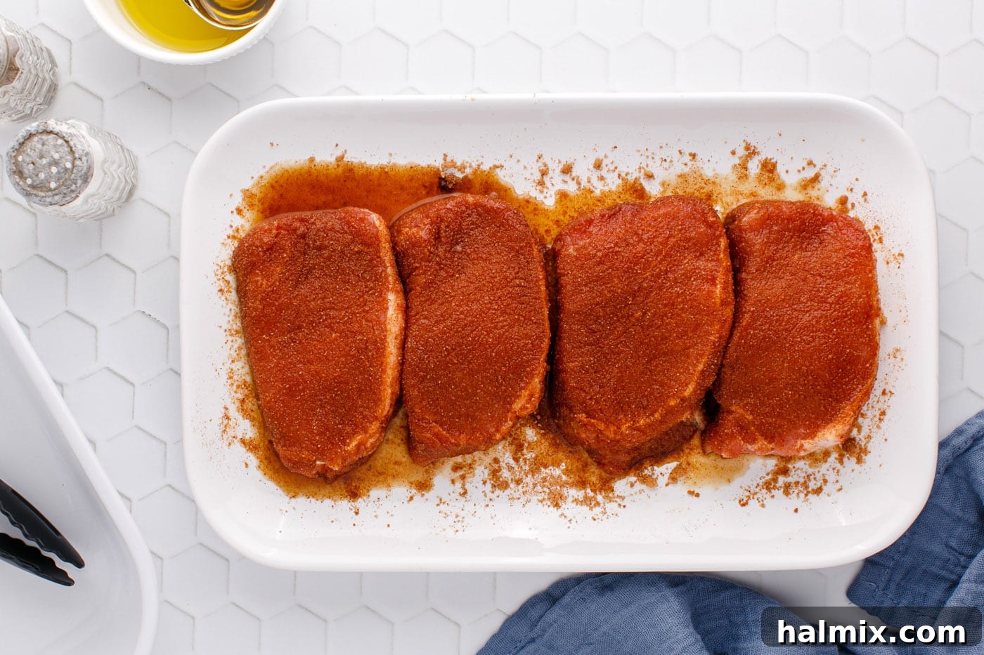 seasoned pork chops on a serving platter