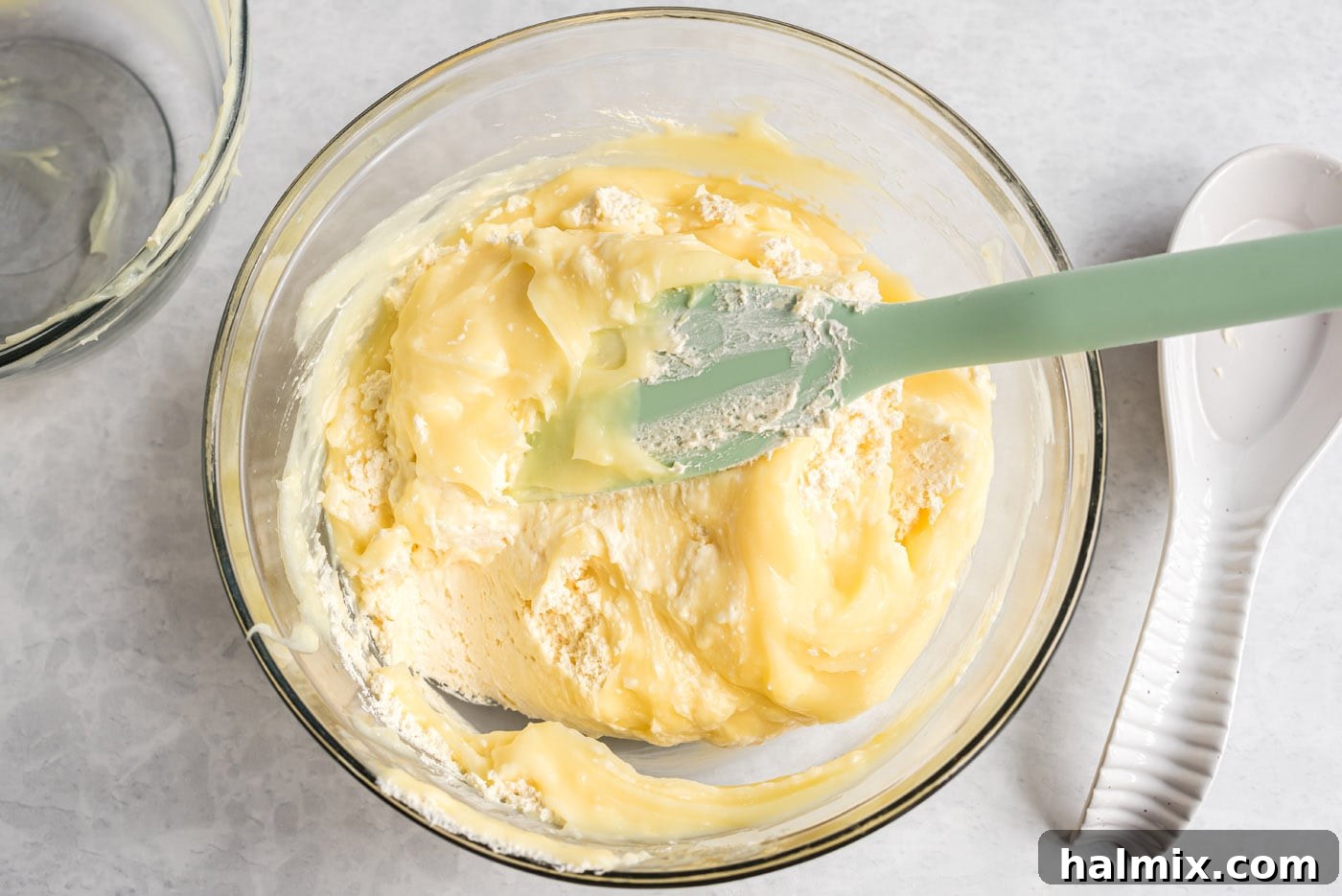 Folding Cream Cheese Mixture into Pudding Stirring the vanilla cream cheese pudding mixture