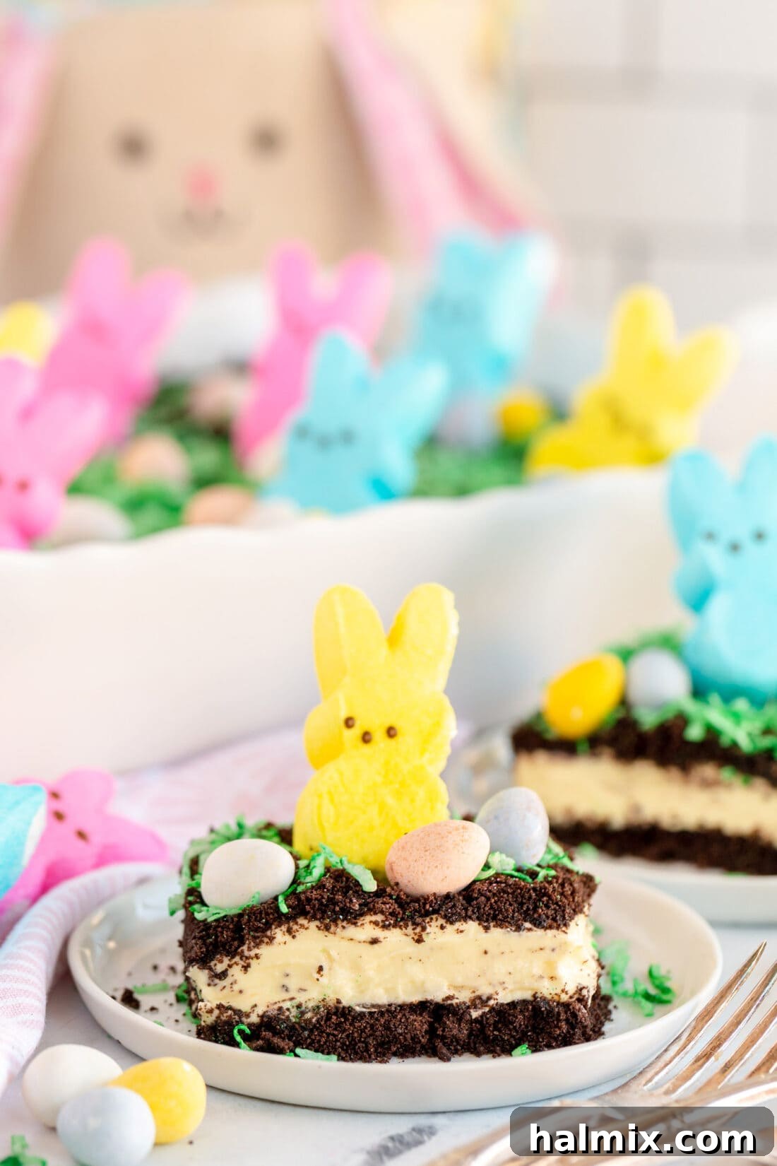 Slice of Delicious Easter Dirt Cake A perfectly sliced piece of Easter Dirt Cake showing layers