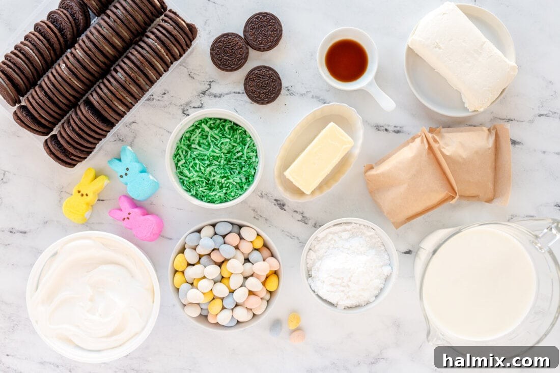 Ingredients for Easy Easter Dirt Cake Collection of Easter Dirt Cake ingredients on a wooden surface