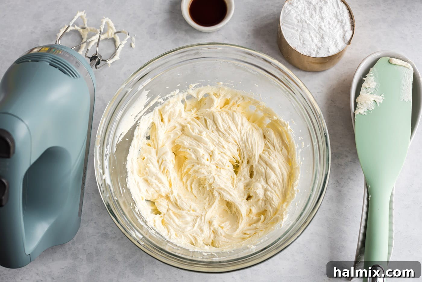 Mixing Cream Cheese and Butter Cream cheese and butter in a mixing bowl being prepared