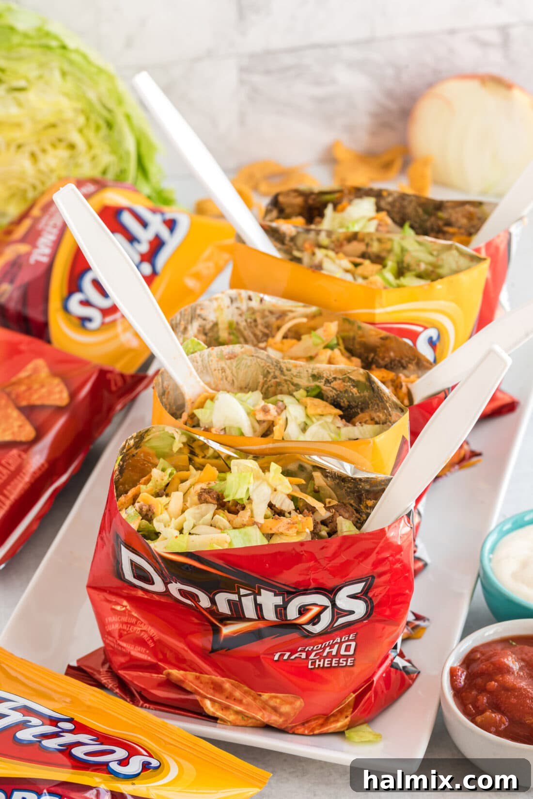 Close-up shot of Walking Tacos in Doritos and Fritos bags