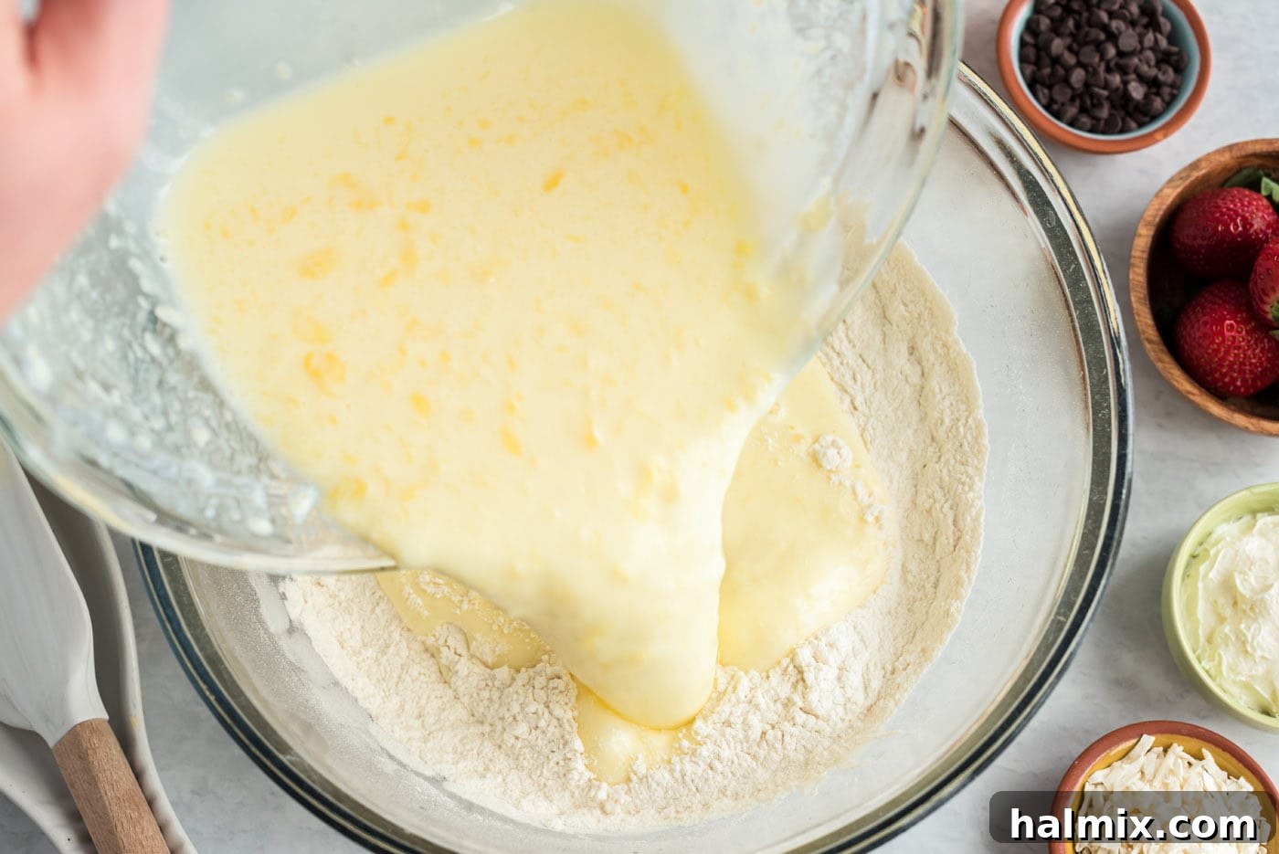 Adding wet ingredients to dry pancake ingredients