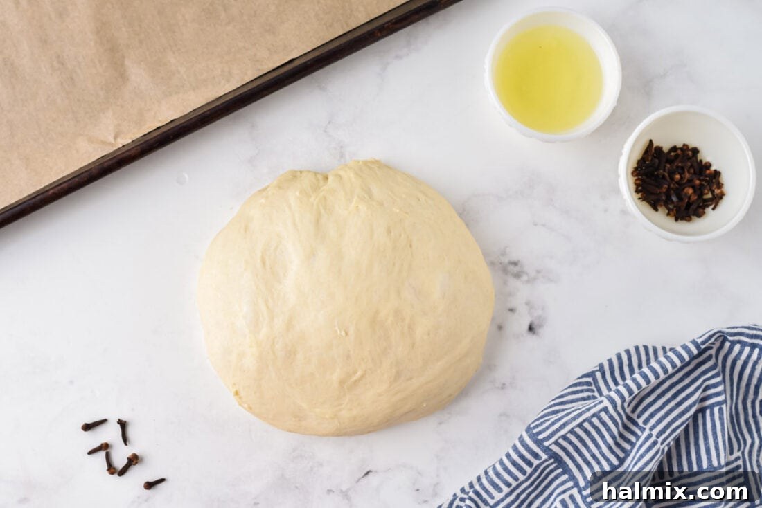 Ingredients for making homemade Bunny Rolls, including flour, yeast, butter, and cloves.