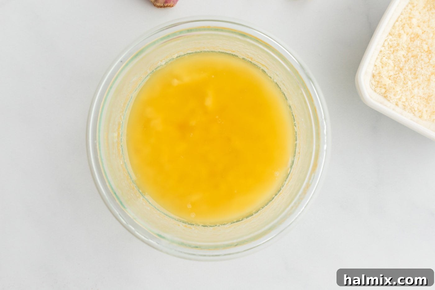 Garlic butter sauce ingredients in a bowl, ready to be melted.