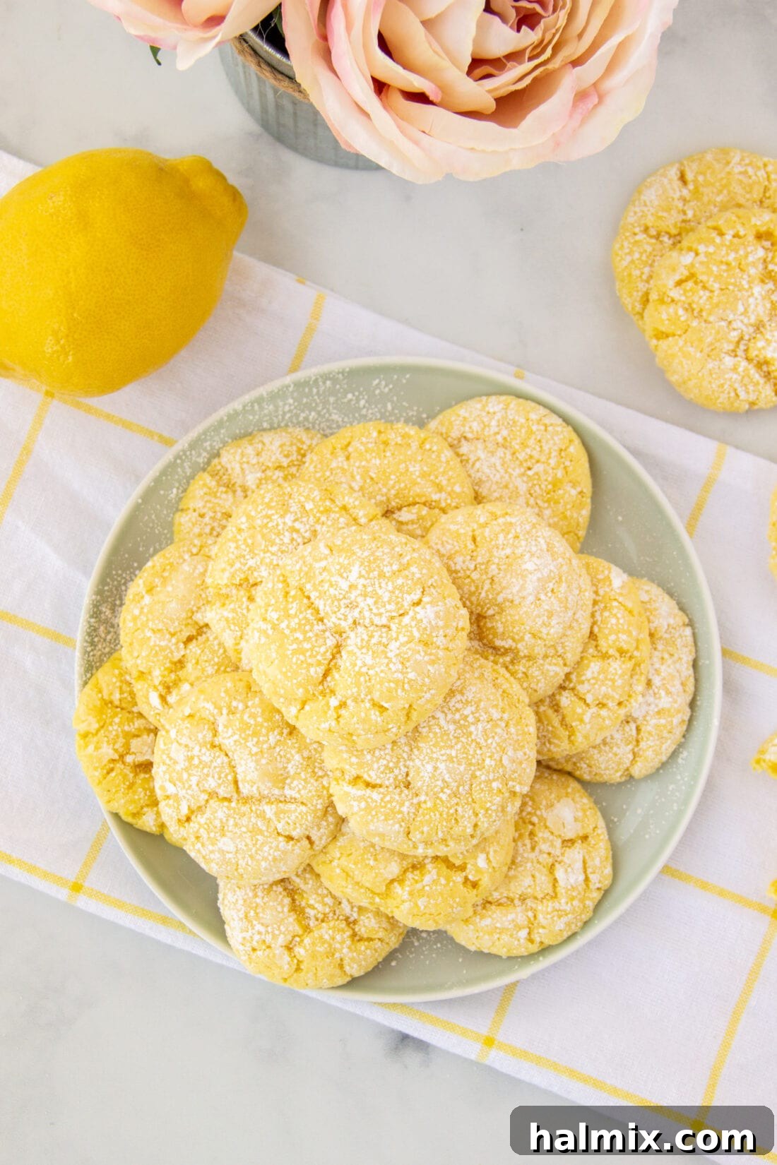 Zesty Lemon Cake Mix Cookies 13 A beautiful plate of freshly baked Lemon Cake Mix Cookies, perfectly arranged and ready to be served.