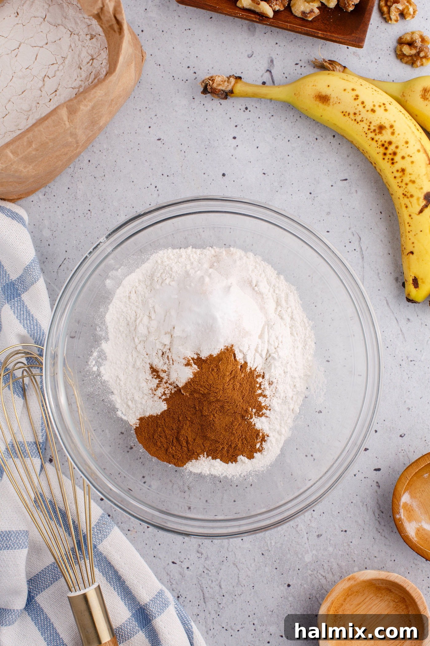 dry ingredients for banana nut bread in a mixing bowl