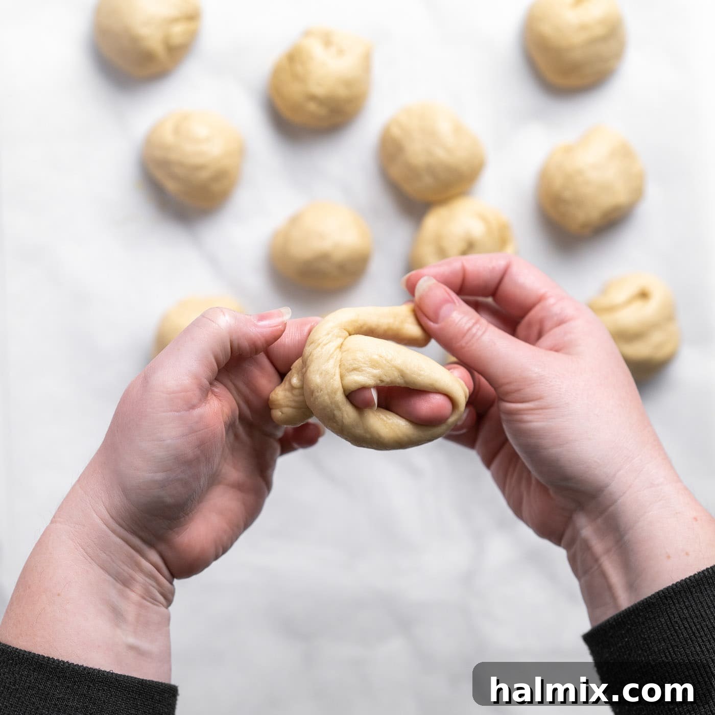 tieing dough into a knot