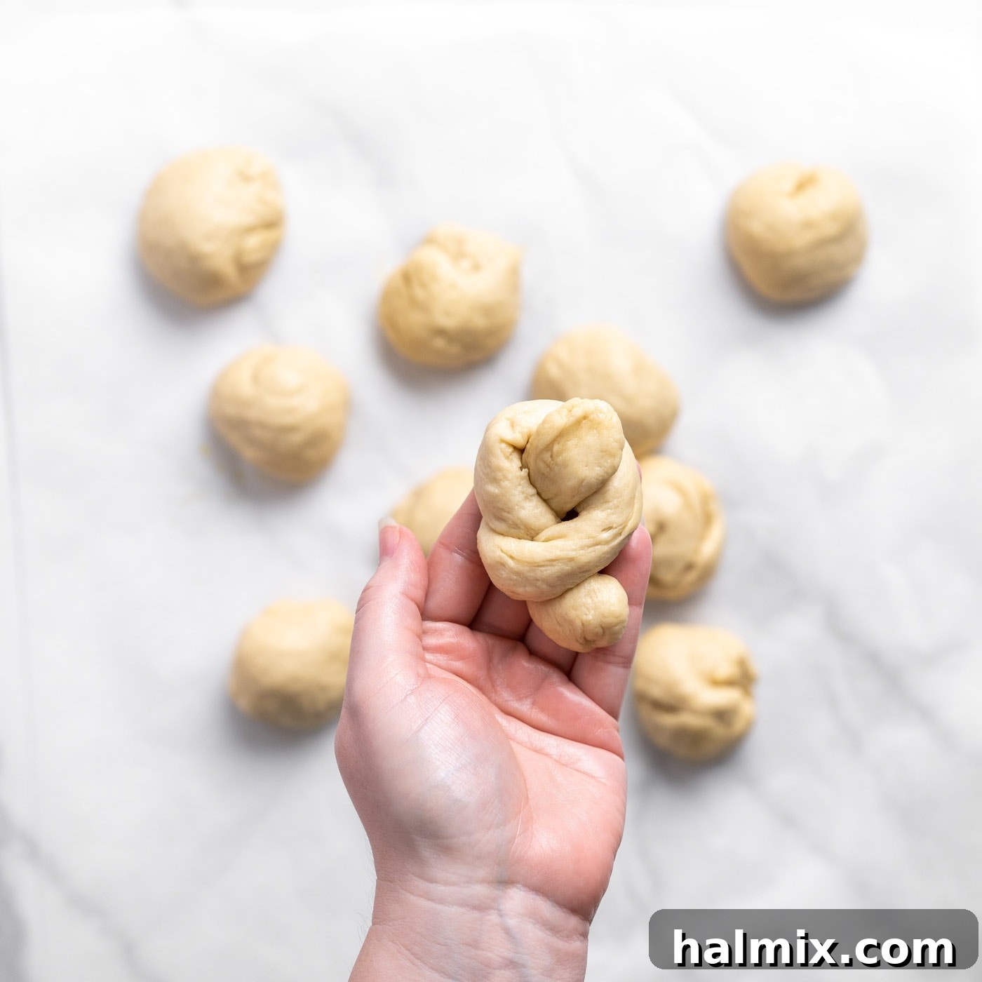 garlic knot dough in hand