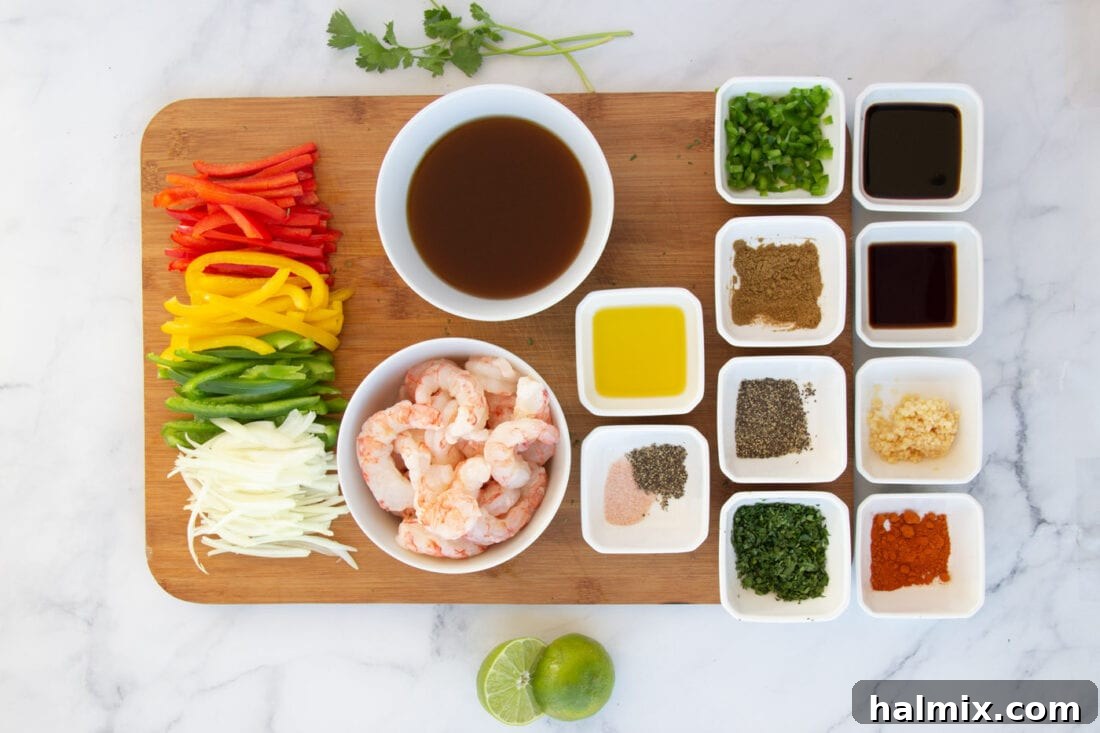 Arrangement of fresh ingredients for Shrimp Fajitas including shrimp, bell peppers, onions, and marinade components