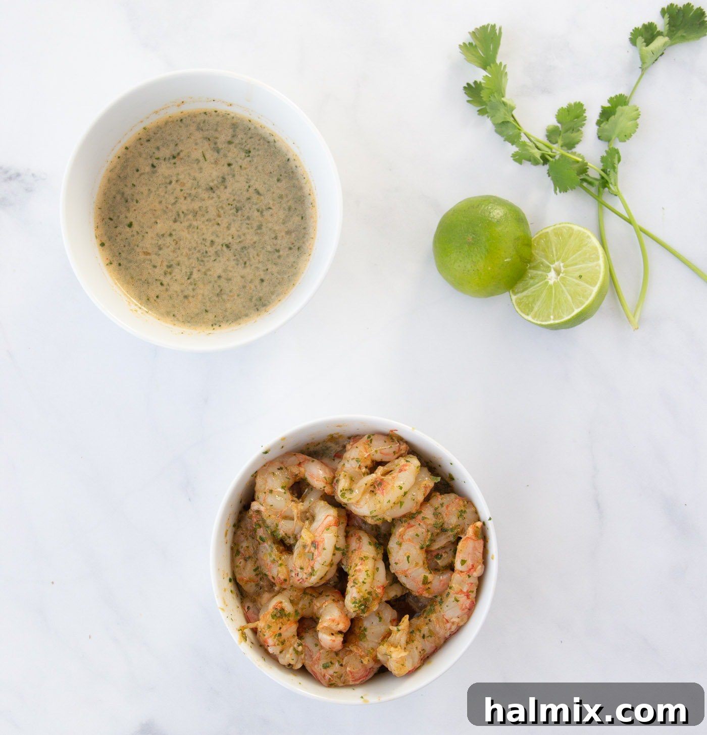 Raw shrimp marinating in a bowl with fajita seasoning