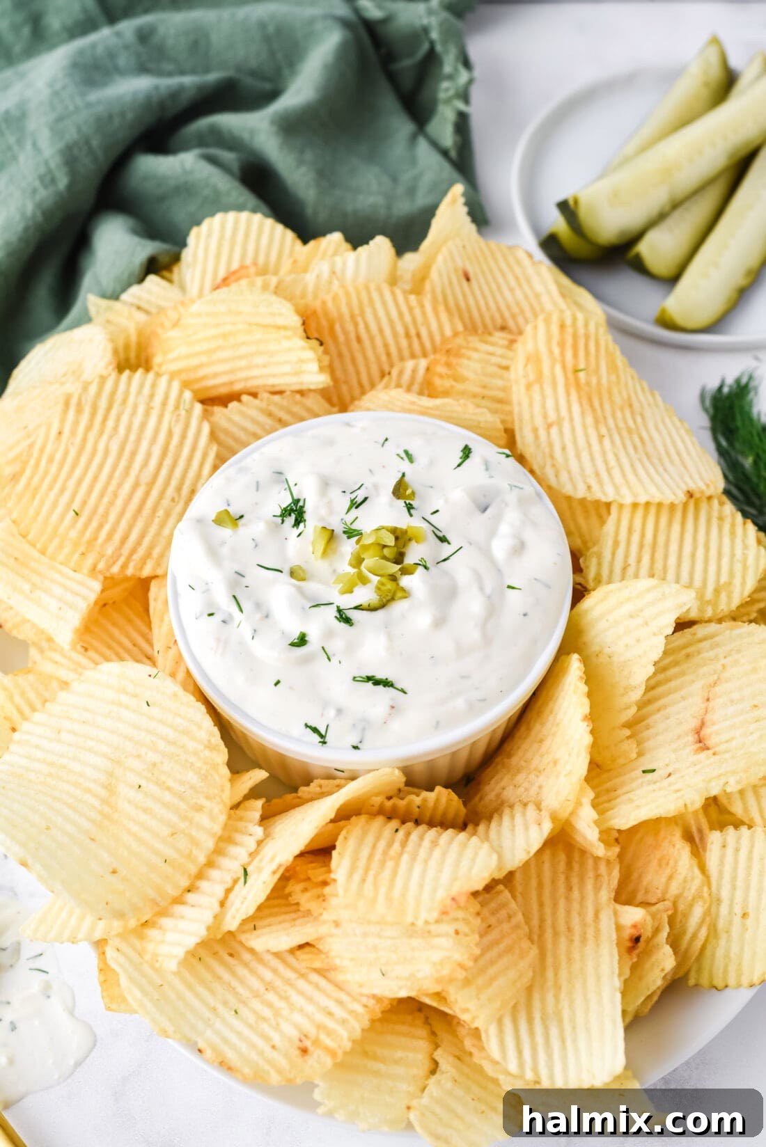 Dill Pickle Dip served with crunchy potato chips