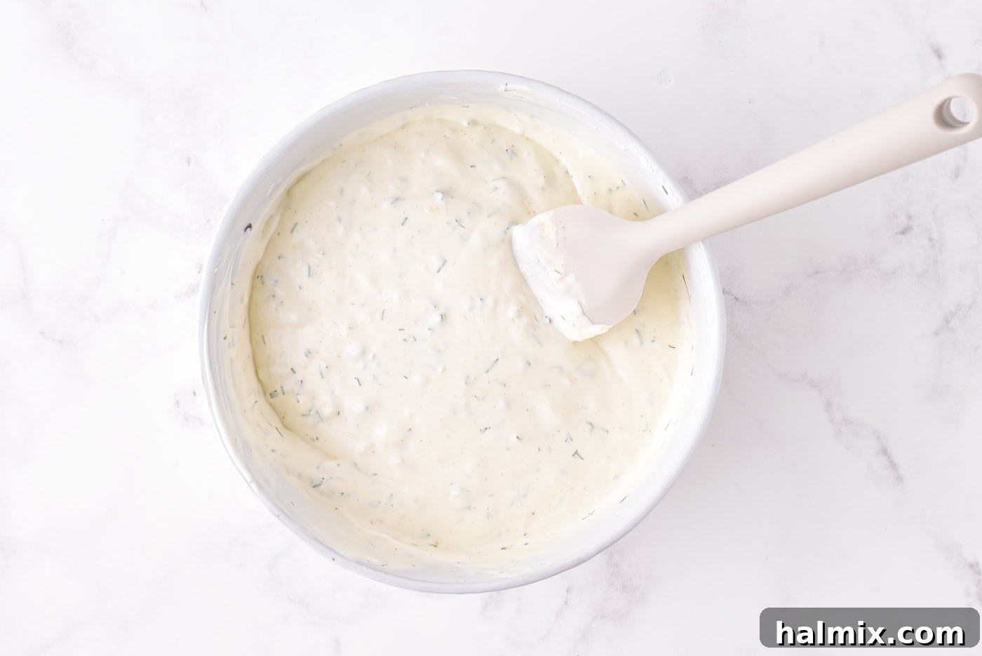 Well-mixed creamy dill pickle dip