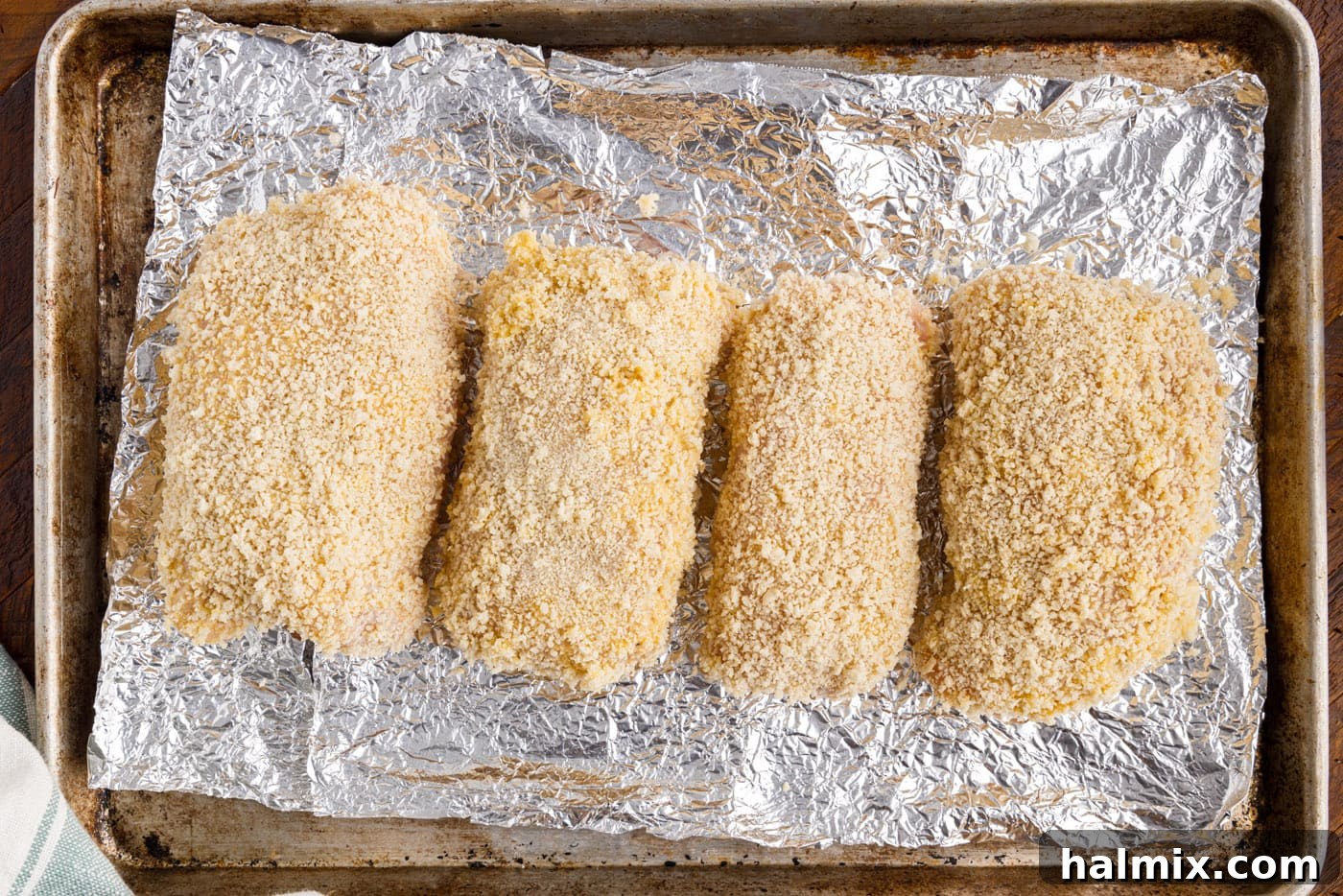 chicken cordon bleu on baking sheet
