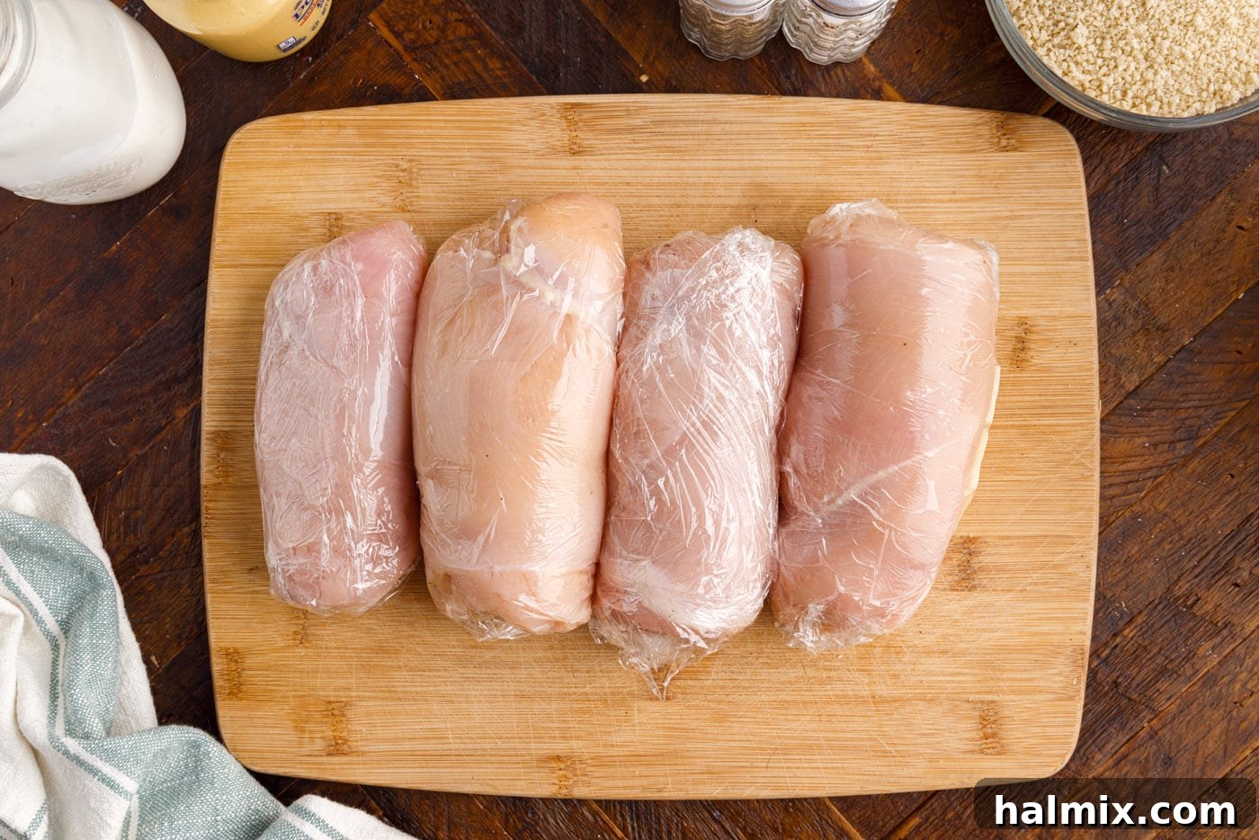 rolled chicken breast on a cutting board