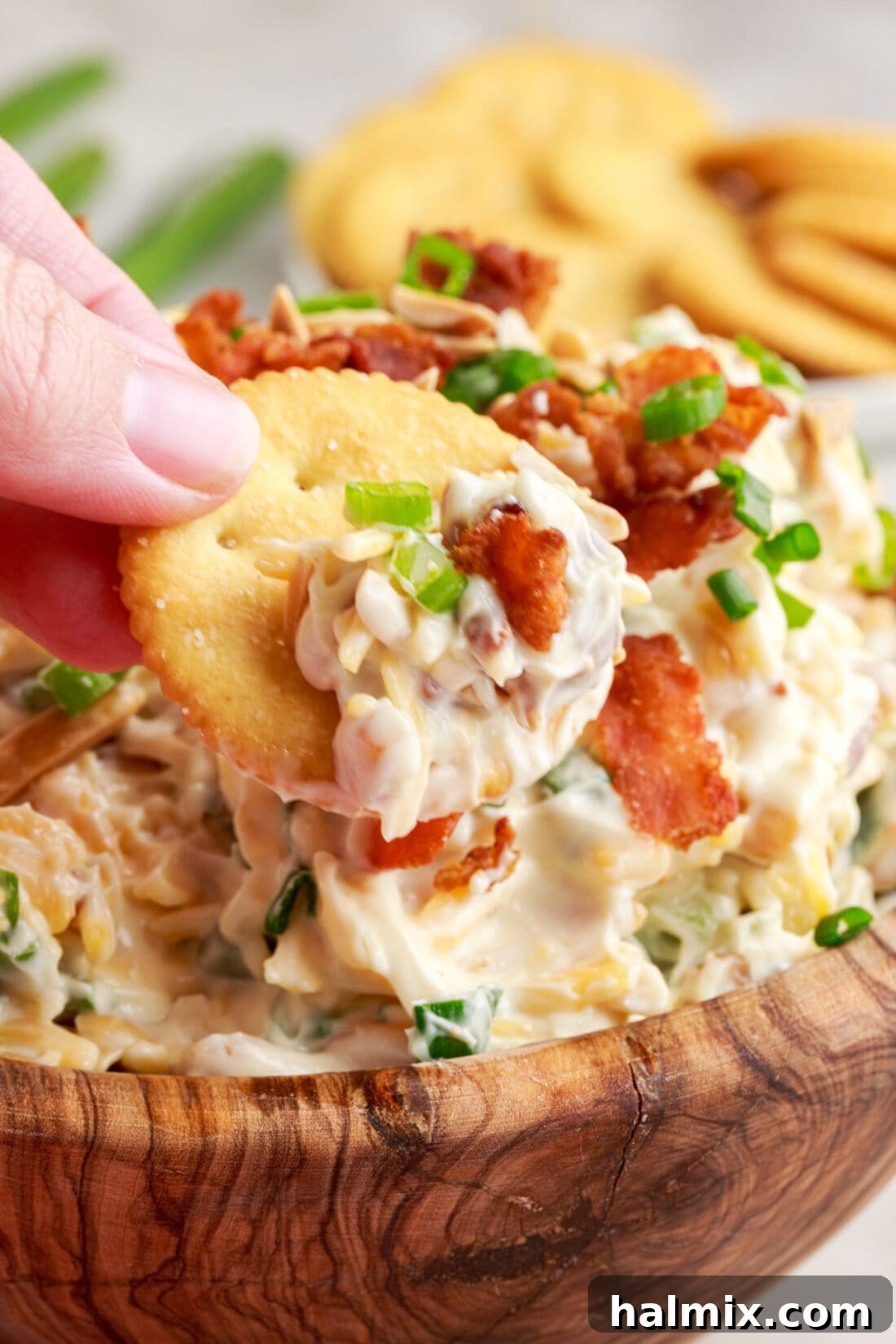 cracker dipped in Million Dollar Dip