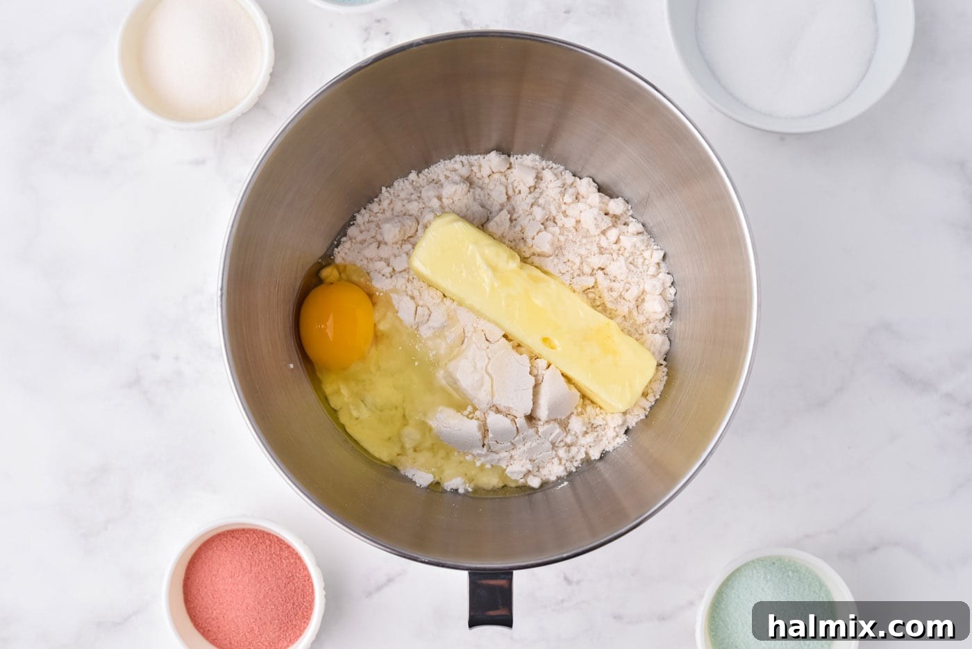 sugar cookie ingredients in a mixing bowl being prepared