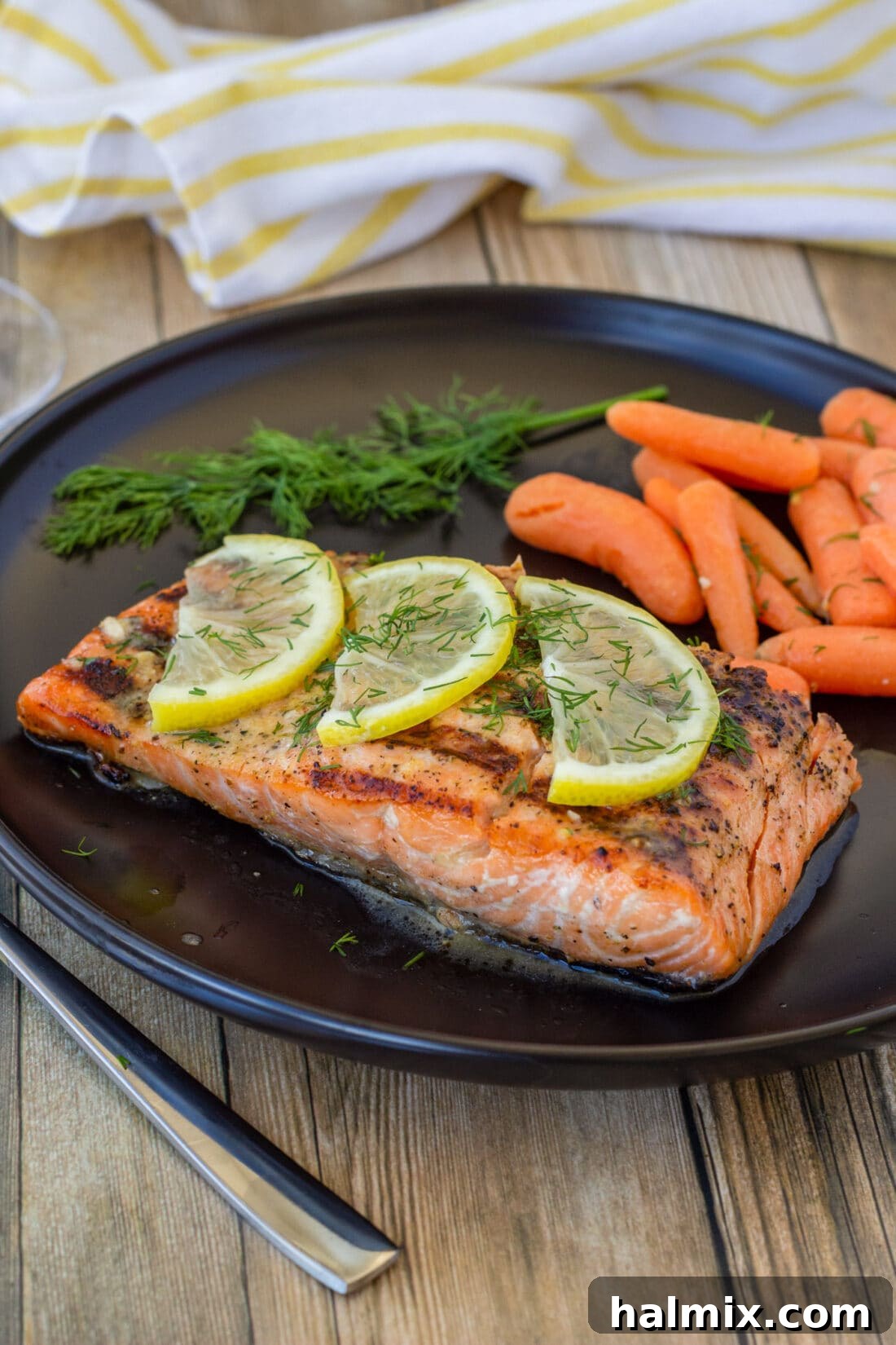 Lemon Salmon with carrots on plate
