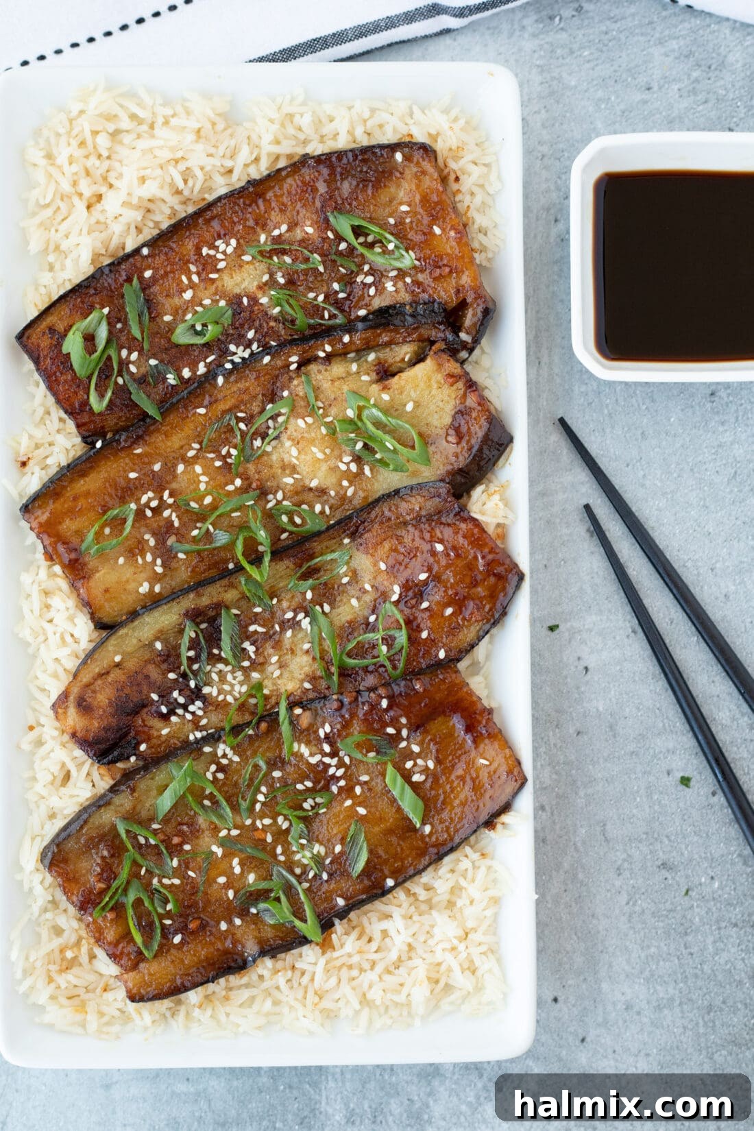 Soy Glazed Eggplant with chopsticks
