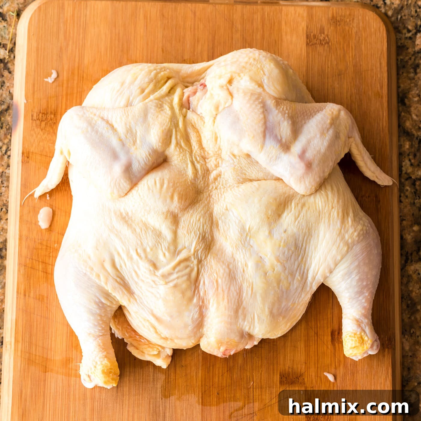 Spatchcocking a whole chicken completely flattened