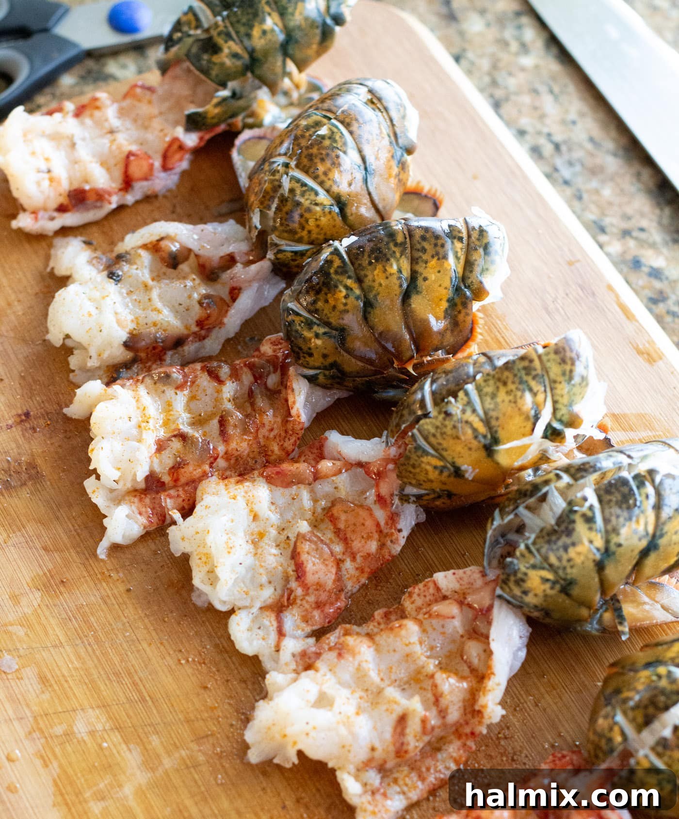 Freshly steamed lobster tails, bright red and ready for preparation