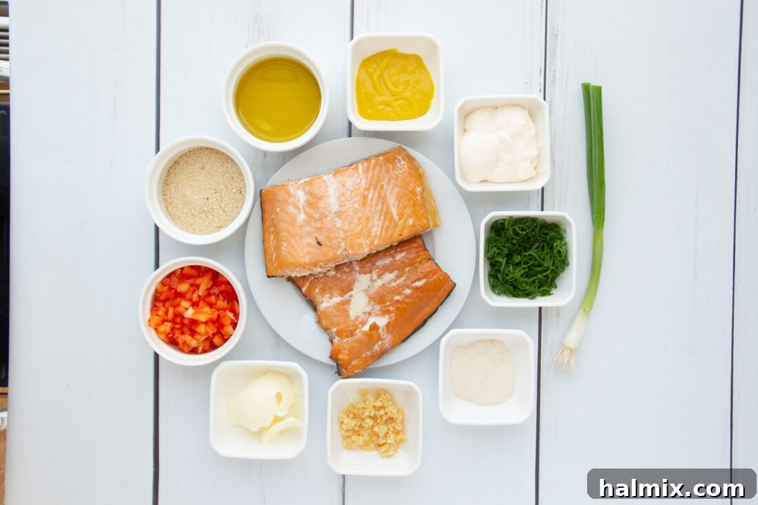 A flat lay photograph showcasing all the fresh ingredients needed to make smoked salmon fish cakes.