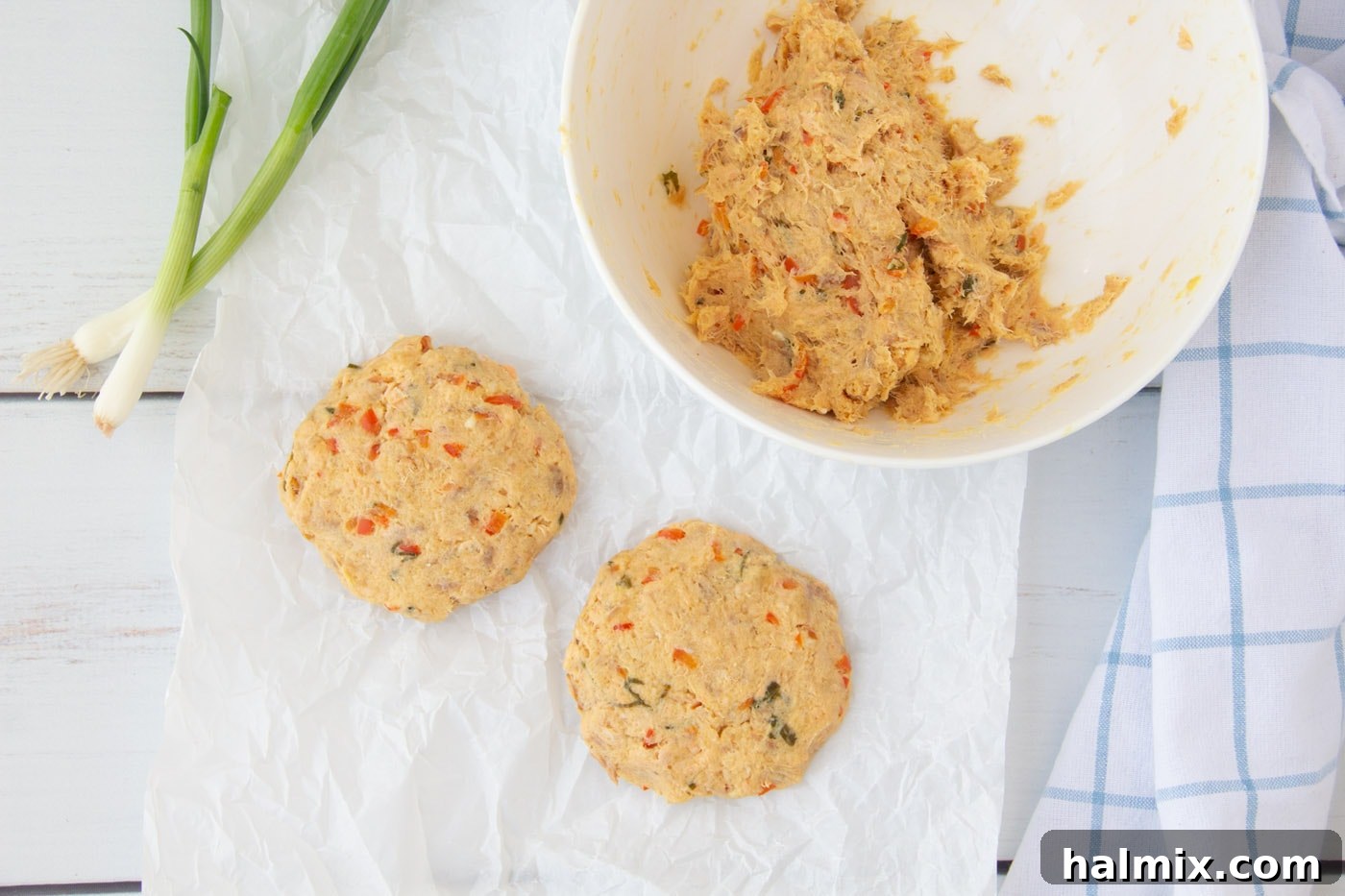Five fish cake patties formed and ready for cooking