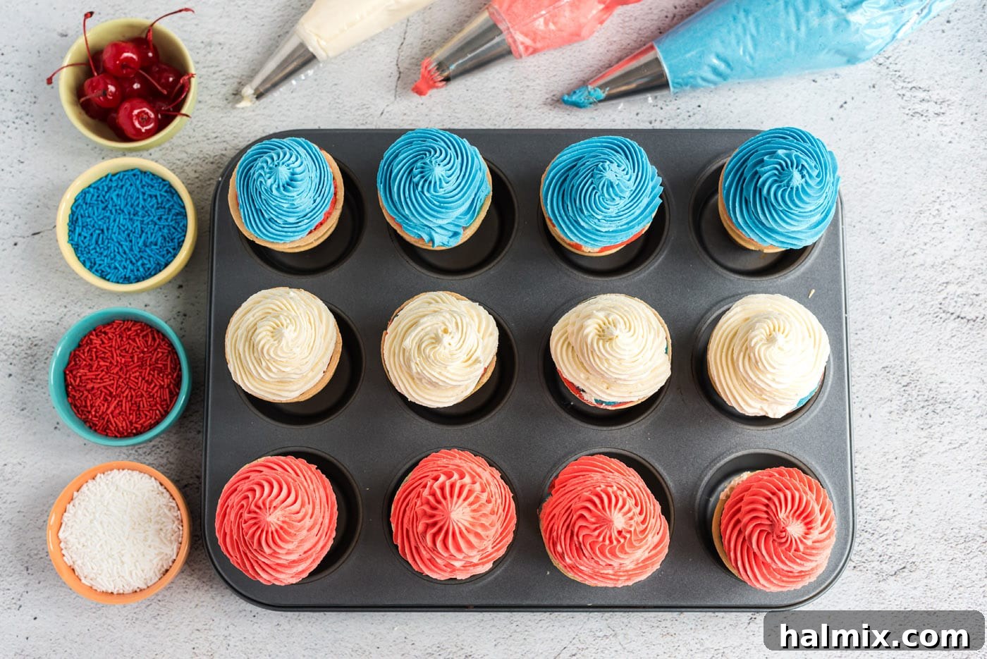 Stars and Stripes Cone Cakes 12 Red, white, and blue frosting piped onto ice cream cone cupcakes
