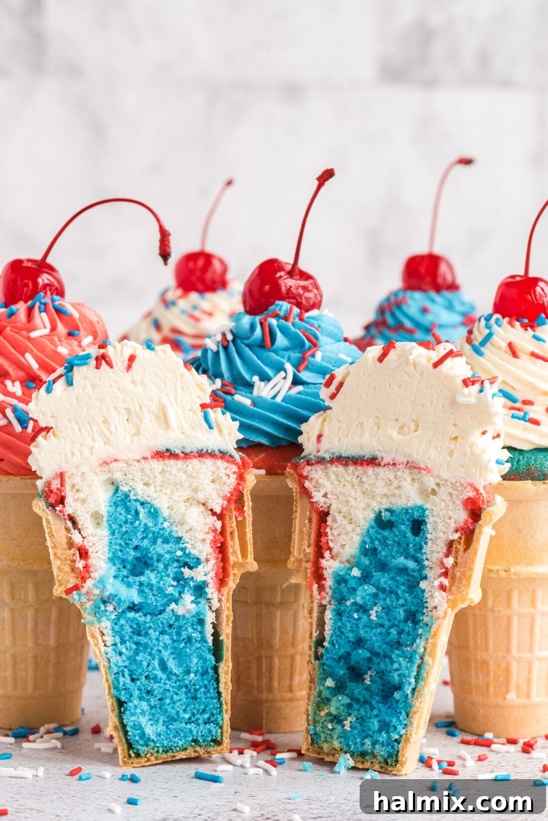 Stars and Stripes Cone Cakes 14 Patriotic Ice Cream Cone Cupcakes sliced in half revealing red, white, and blue cake layers
