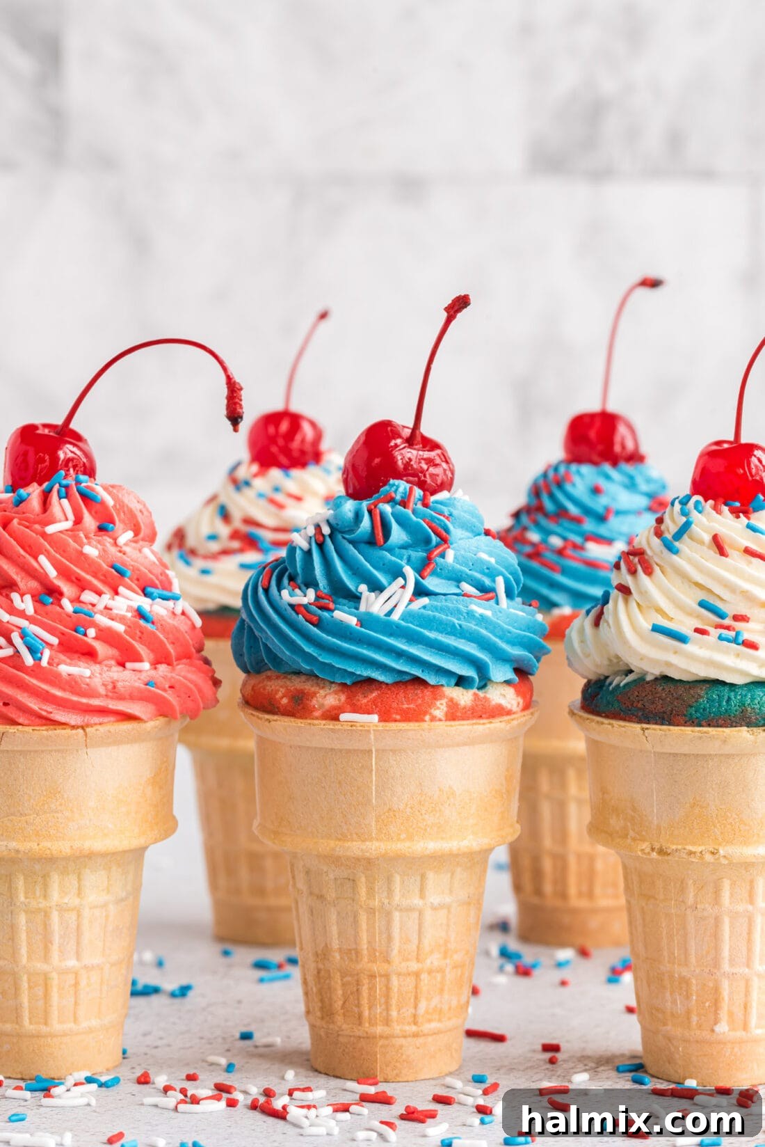Stars and Stripes Cone Cakes 3 Patriotic Ice Cream Cone Cupcakes topped with cherries and sprinkles