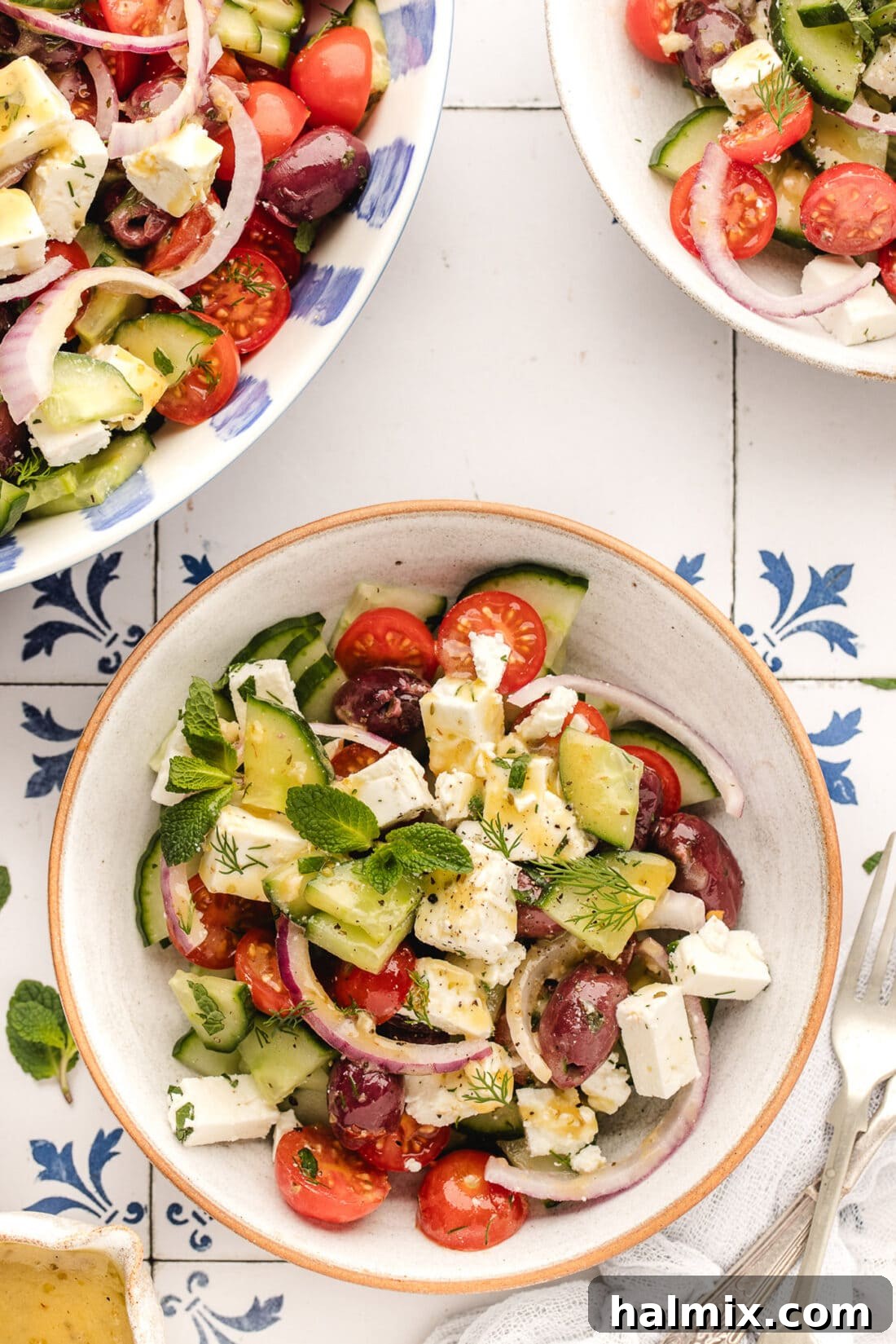 Three bowls of Greek Salad