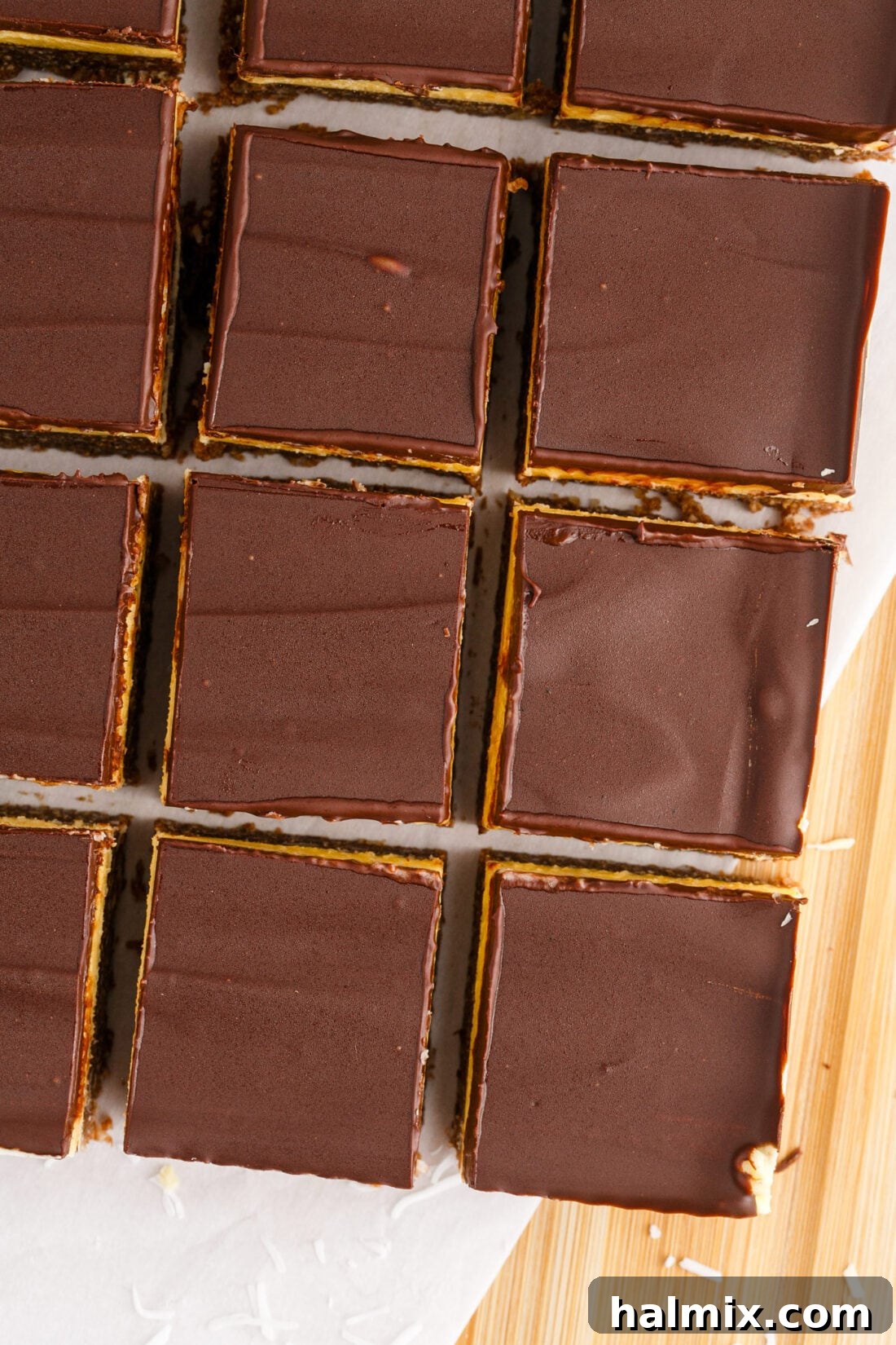 Overhead shot of freshly cut Nanaimo Bars, revealing the perfect layers.