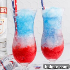 Patriotic Vodka Lemonade Slushie - A delightful layered cocktail for 4th of July.