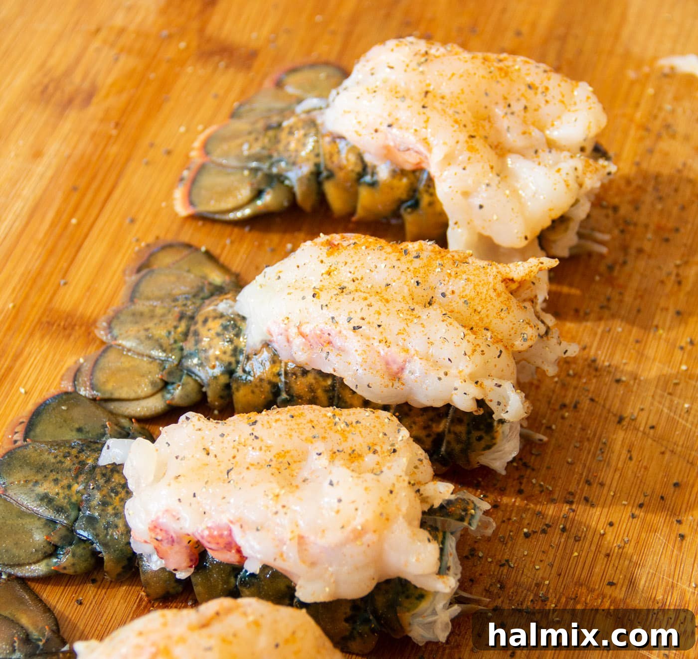 crowned lobster tail on cutting board