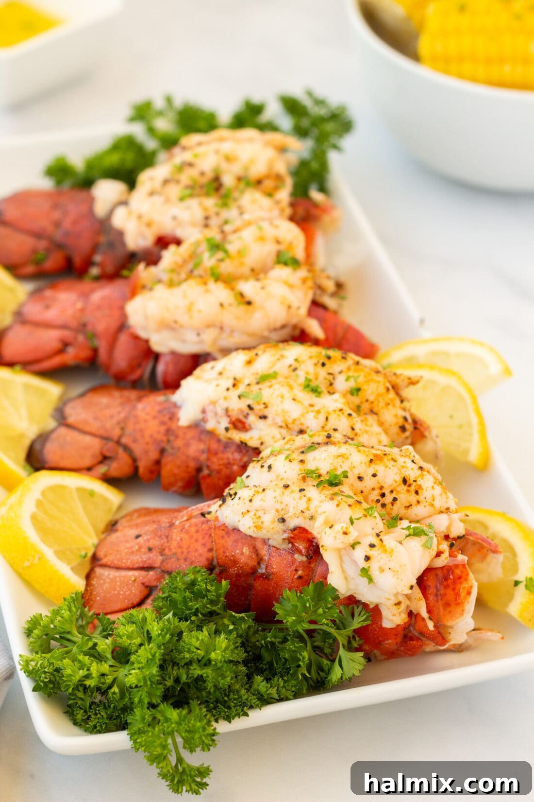 4 Steamed Lobster Tails on a platter