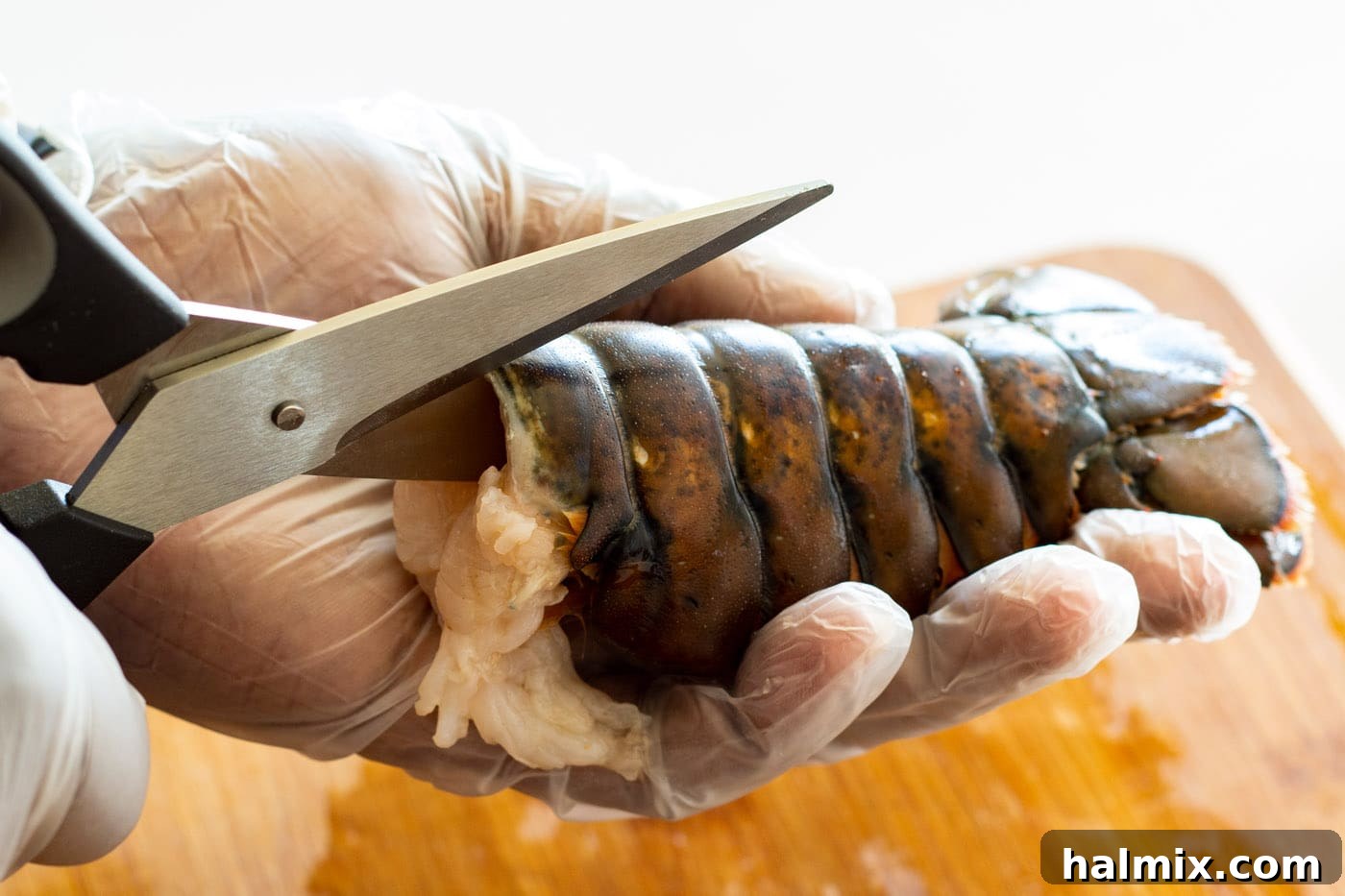 kitchen sheers cutting lobster tail