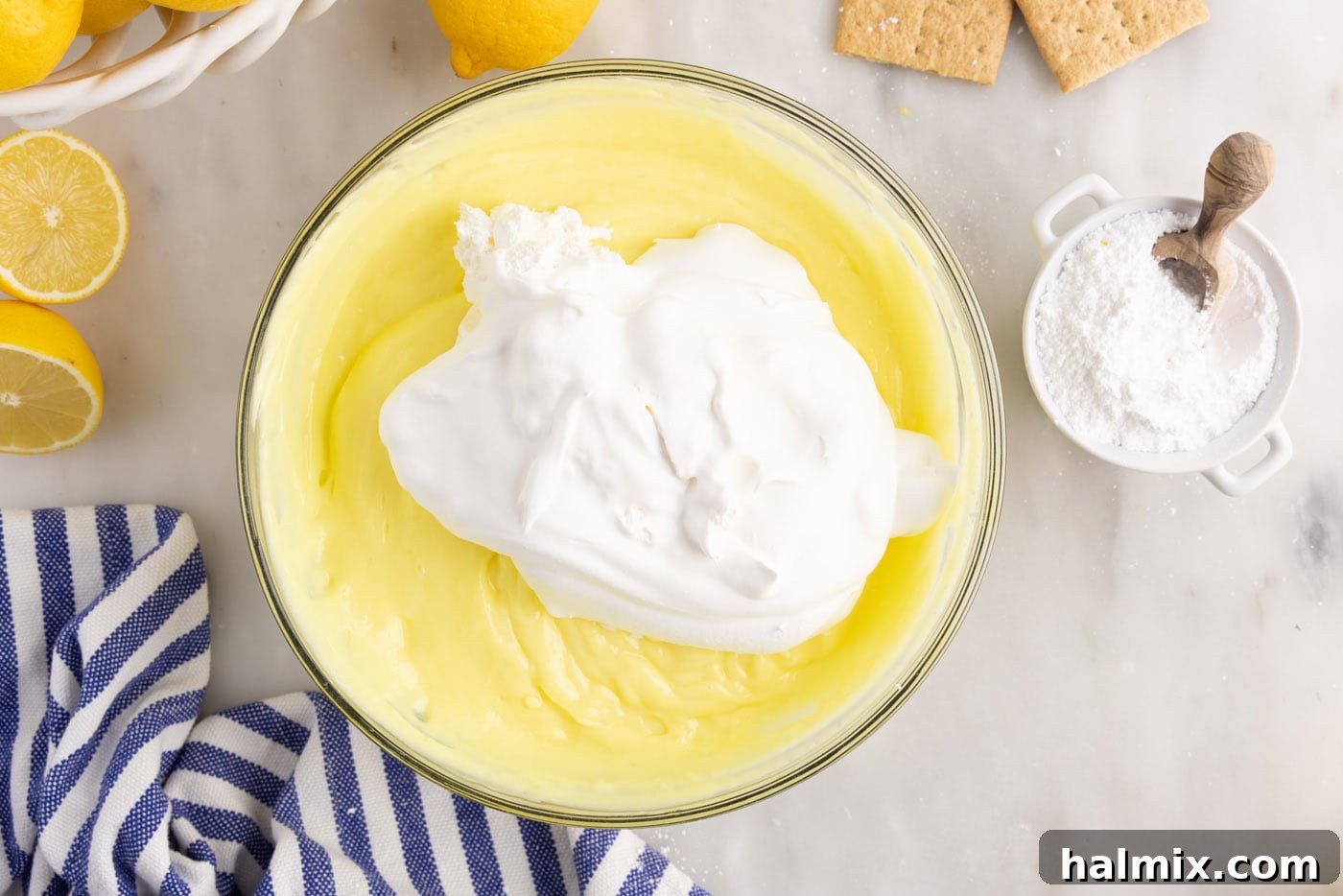 whipped topping. ontop of lemon pudding