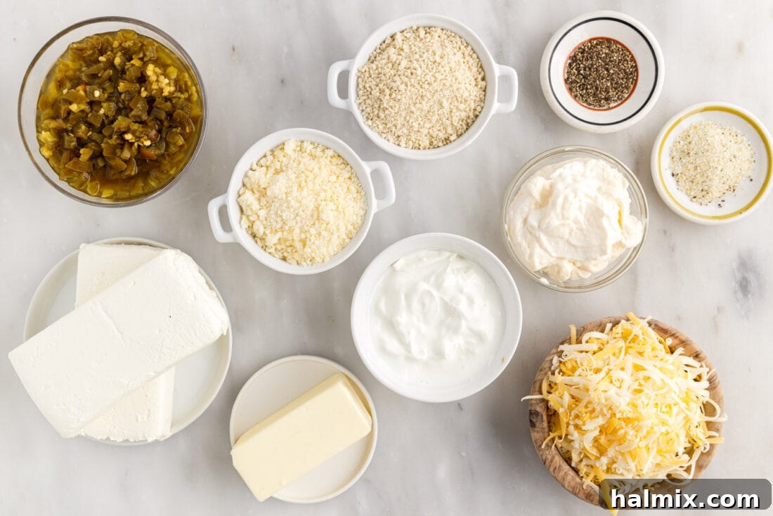 A flat lay photograph showcasing all the ingredients required for Jalapeno Popper Dip