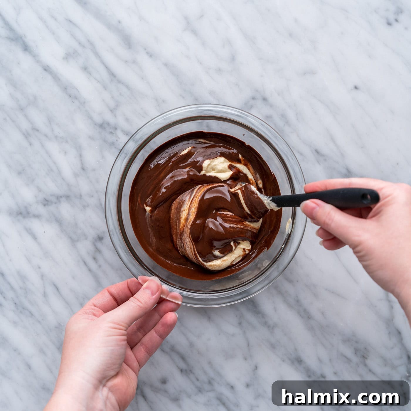Swirled Delight 11 stirring melted chocolate into the yellow cake batter to create chocolate batter