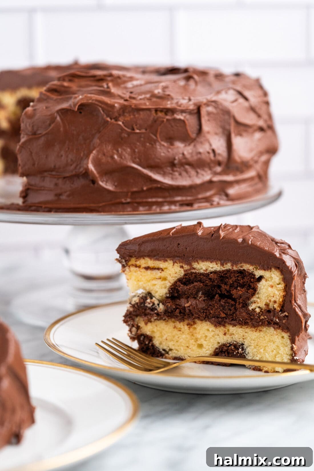 Swirled Delight 3 slice of Marble Cake on plate, revealing the intricate chocolate and vanilla swirl pattern