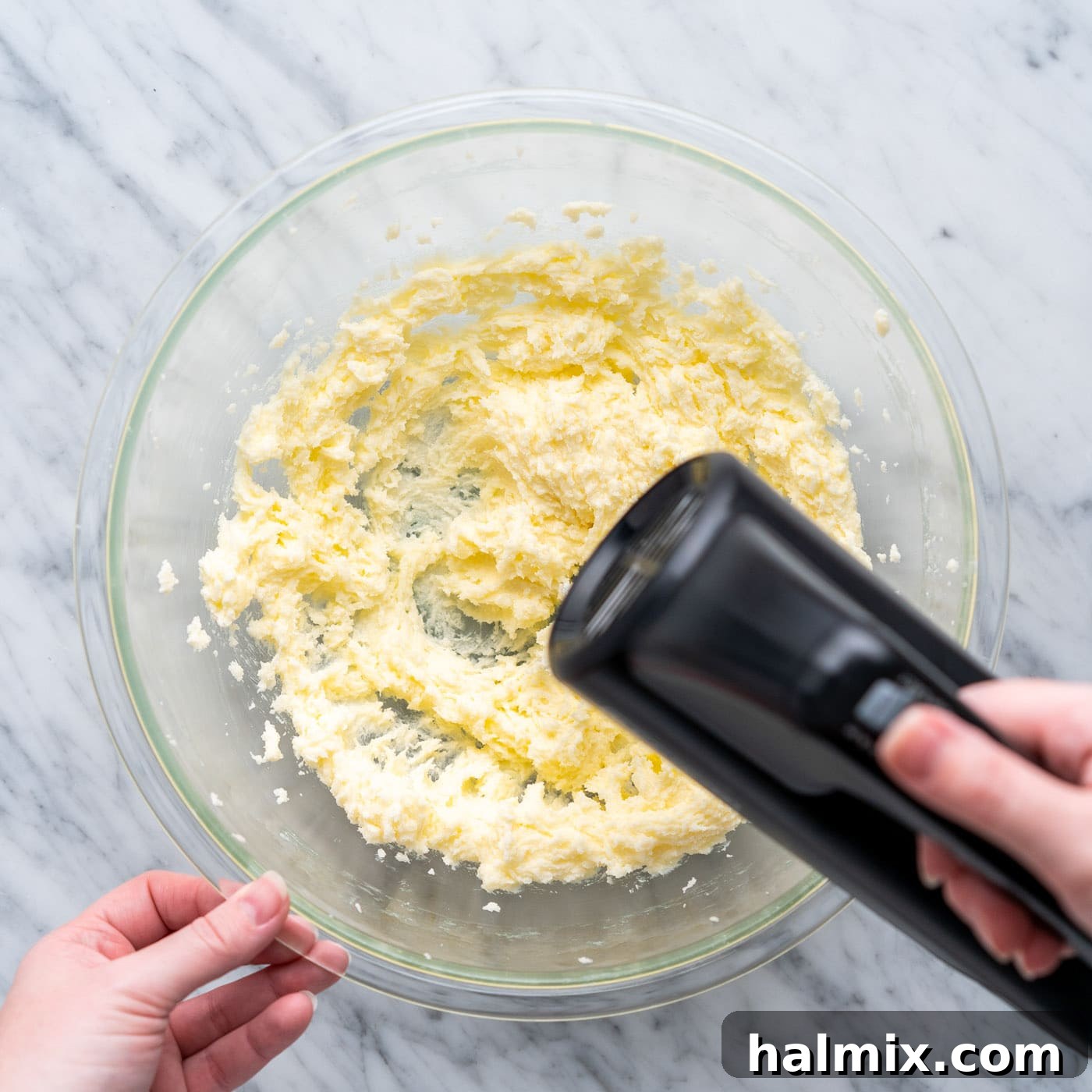 Swirled Delight 6 butter and sugar being beaten together by a hand mixer in a large bowl