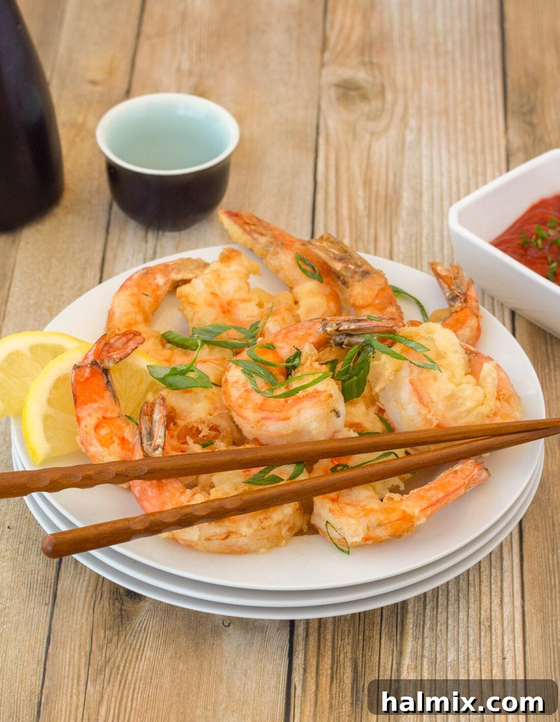 Crunchy Ocean Gems 2 plate of Crispy Shrimp with chopsticks