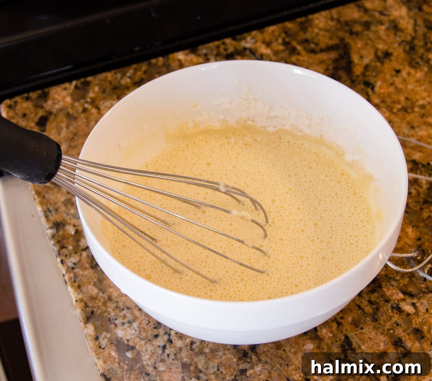 Crunchy Ocean Gems 7 egg, flour, and water whisked in a bowl