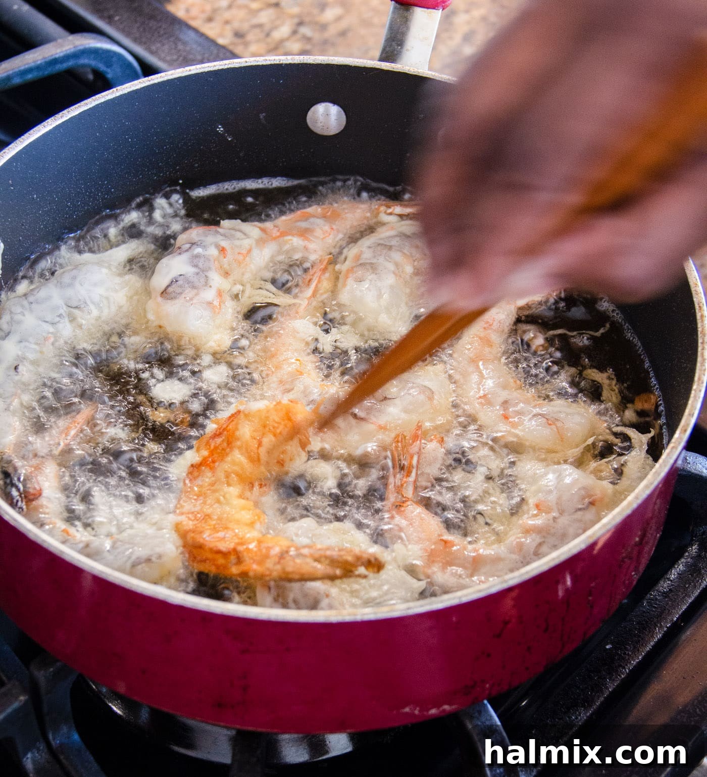 Crunchy Ocean Gems 10 turning crispy fried shrimp in oil