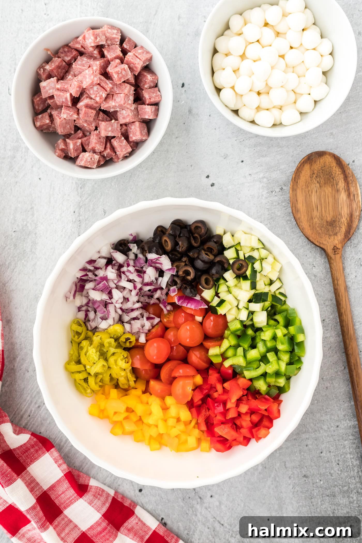 Trattoria Toss 5 chopped veggies for pasta salad in a bowl