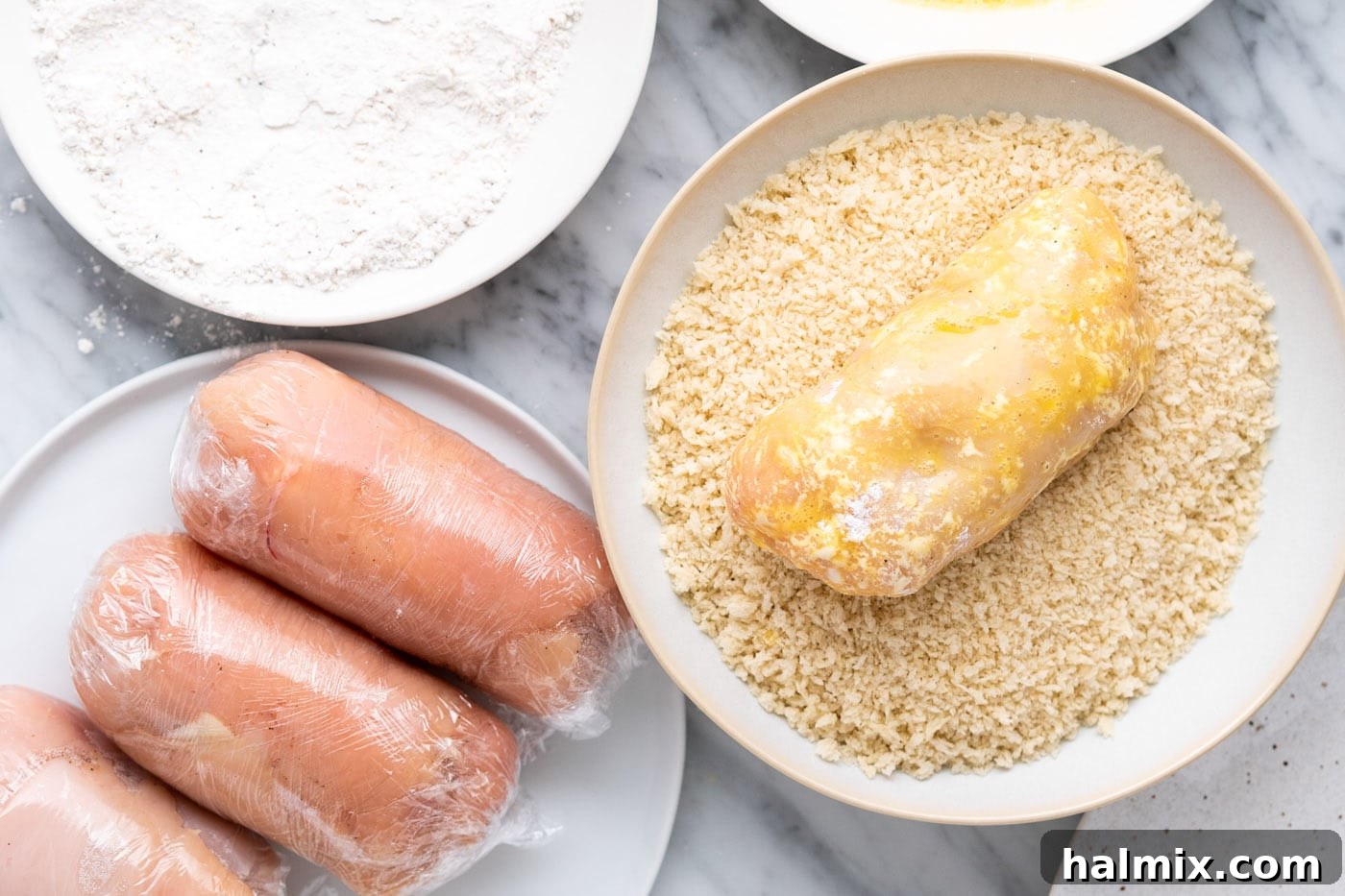 Crispy Air Fryer Chicken Cordon Bleu 12 Final step of coating chicken cordon bleu in panko breadcrumbs.