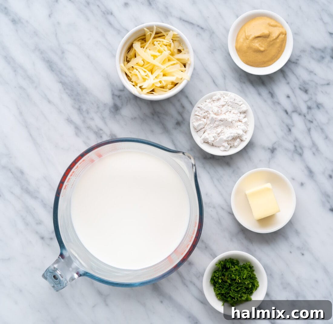 Crispy Air Fryer Chicken Cordon Bleu 5 Key ingredients for the Dijon cream sauce, including butter, flour, milk, and Dijon mustard.